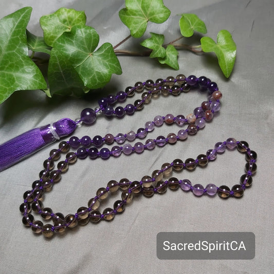 Ascension ~ LAVENDER AMETHYST, SMOKY QUARTZ, SUPER/SACRED SEVEN Gemstone Meditation Gift Set: Hand-Knotted, 108 Tassel Mala Necklace, Lotus Soy Candle, and Palo Santo Stick Bundle.