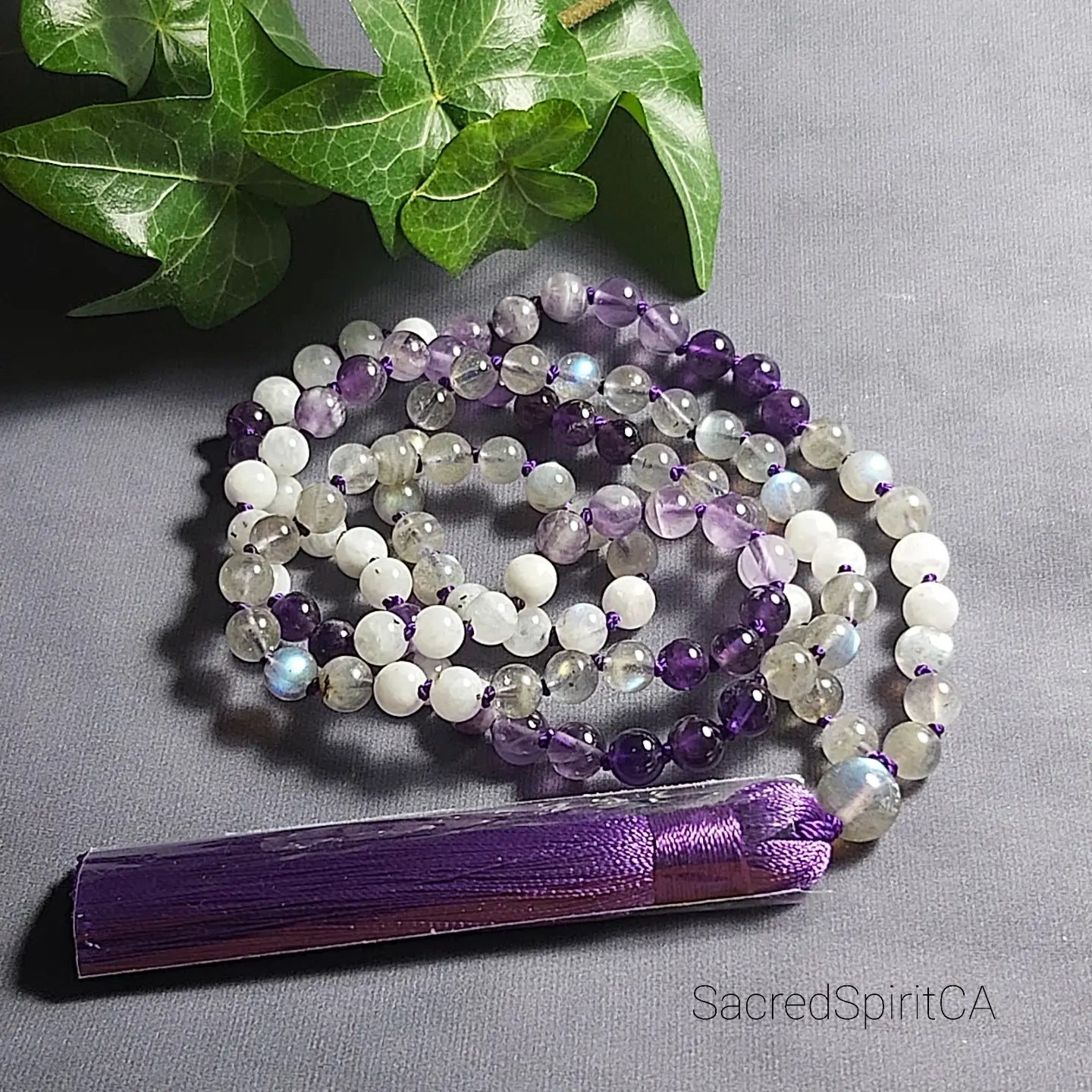 RAINBOW MOONSTONE, AMETHYST, LABRADORITE Gemstone Meditation Gift Set: Hand-Knotted, 108 Tassel Mala Necklace, Bracelet, Lotus Flower Soy Candle, and Palo Santo Stick Bundle.